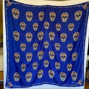 Skull scarf multi colours on cobalt blue ground.